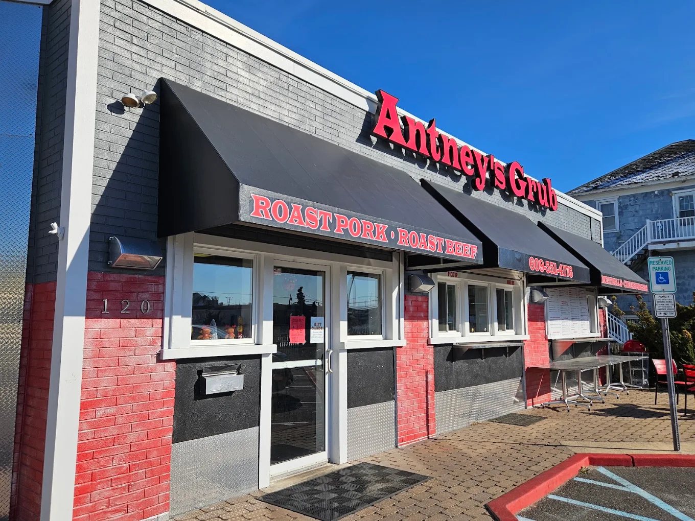 Antney's Grub storefront at 120 W Walnut Ave, North Wildwood, NJ, showing the Roast Pork and Roast Beef awning